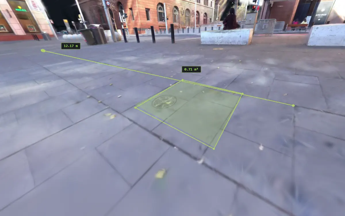 A 12.17 m distance and a 0.71 m² area measured on the paving at Martin Place, Sydney